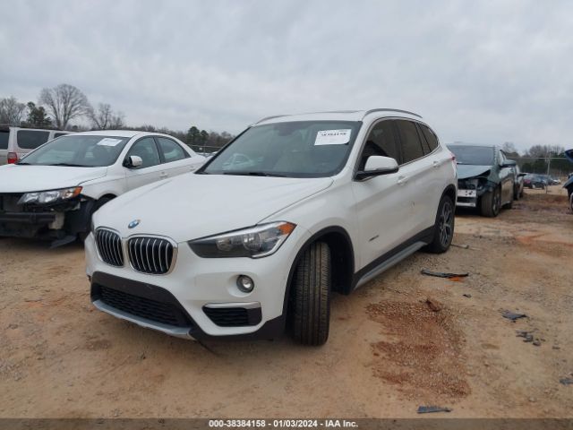 Photo 1 VIN: WBXHT3C37H5F75332 - BMW X1 