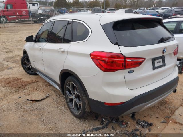 Photo 2 VIN: WBXHT3C37H5F75332 - BMW X1 