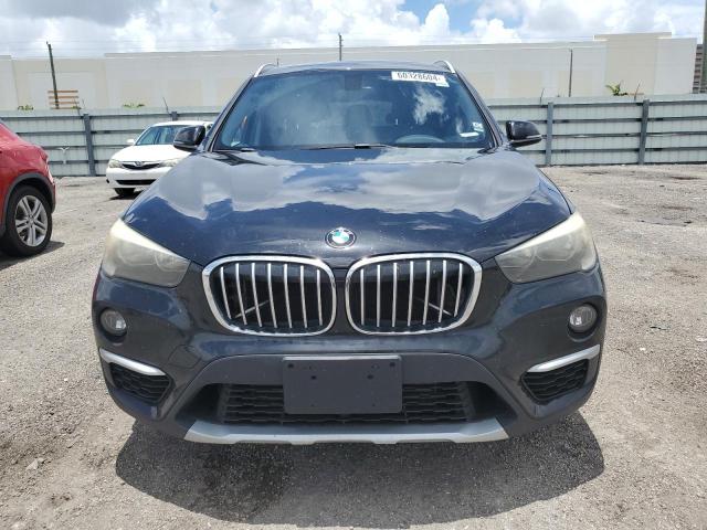 Photo 4 VIN: WBXHT3C37H5F76528 - BMW X1 