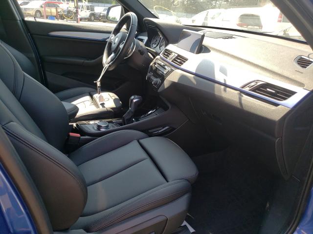 Photo 4 VIN: WBXHT3C37H5F81096 - BMW X1 