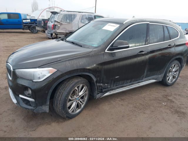 Photo 1 VIN: WBXHT3C37H5F81101 - BMW X1 