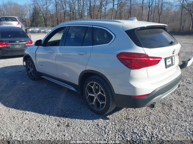 Photo 2 VIN: WBXHT3C37H5F81647 - BMW X1 