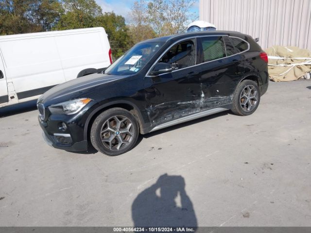 Photo 1 VIN: WBXHT3C37H5F87772 - BMW X1 