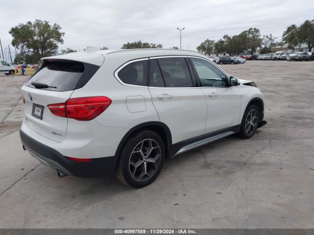 Photo 3 VIN: WBXHT3C37J3H33461 - BMW X1 