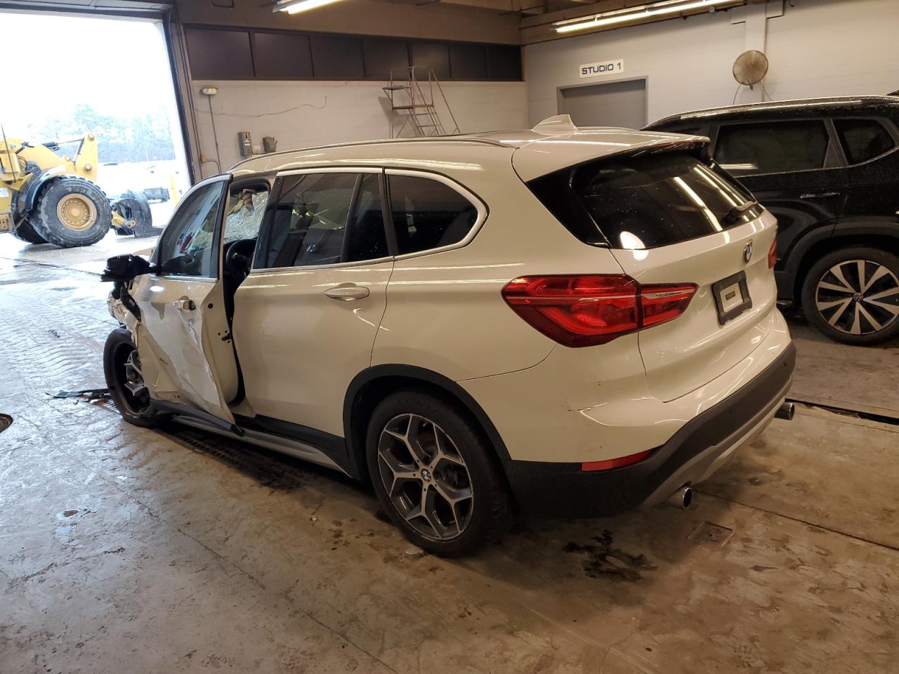 Photo 1 VIN: WBXHT3C37J5K29591 - BMW X1 