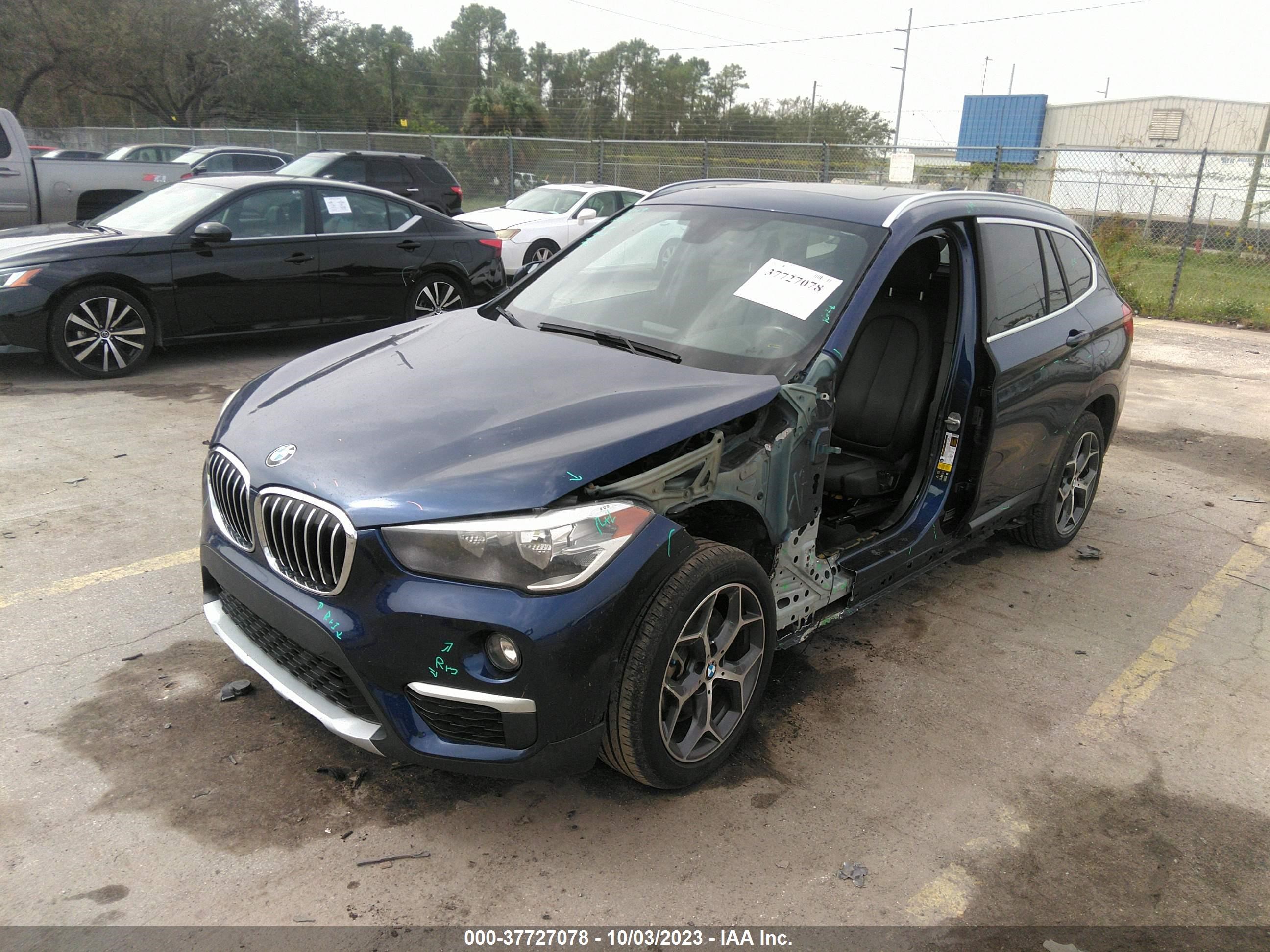 Photo 1 VIN: WBXHT3C37J5L24104 - BMW X1 