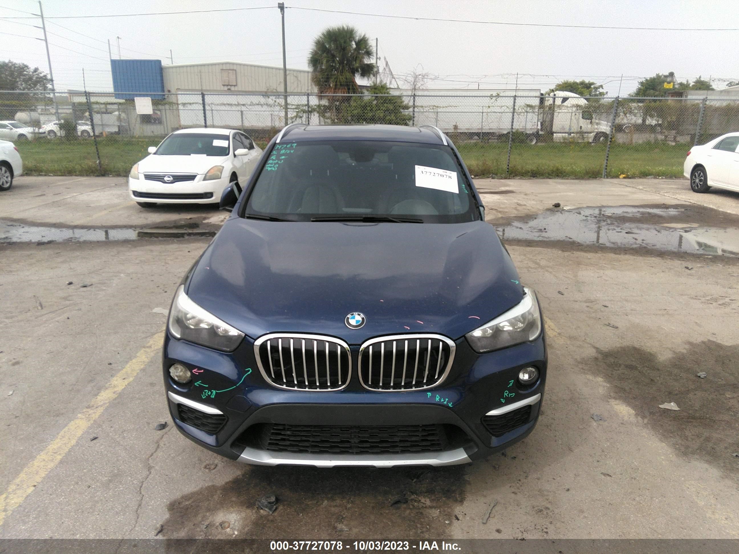 Photo 11 VIN: WBXHT3C37J5L24104 - BMW X1 