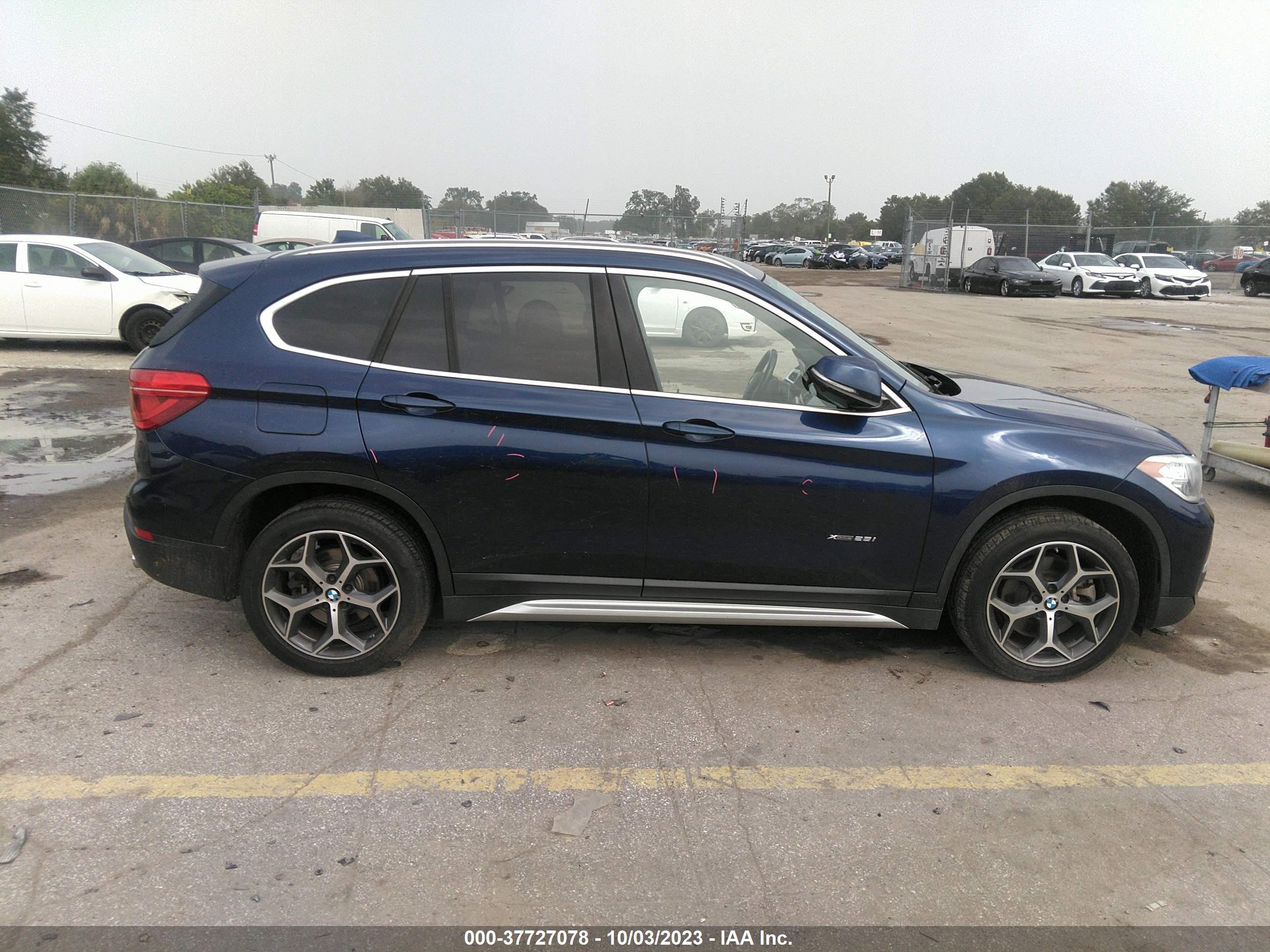 Photo 12 VIN: WBXHT3C37J5L24104 - BMW X1 