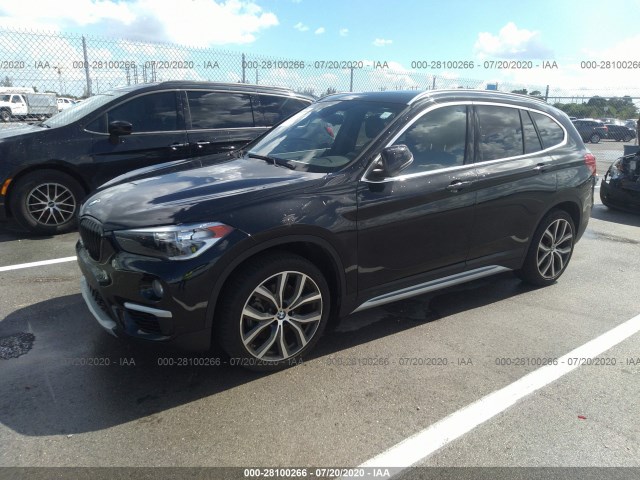 Photo 1 VIN: WBXHT3C37J5L27035 - BMW X1 