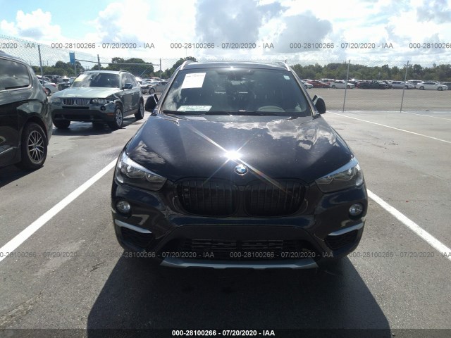 Photo 5 VIN: WBXHT3C37J5L27035 - BMW X1 