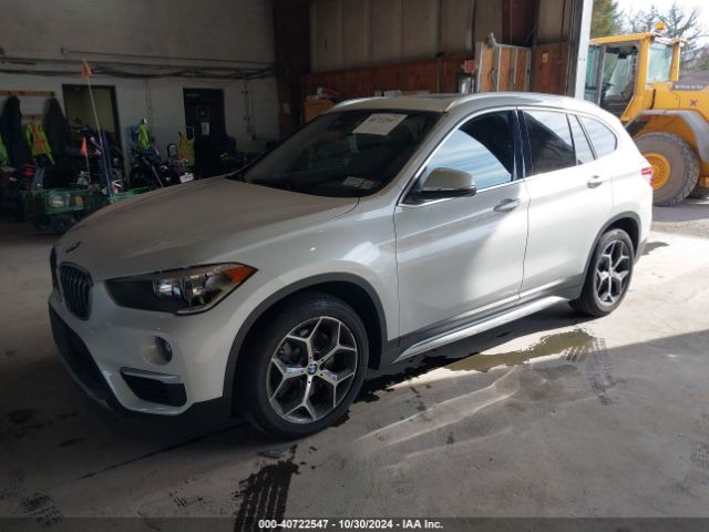 Photo 1 VIN: WBXHT3C37J5L33837 - BMW X1 