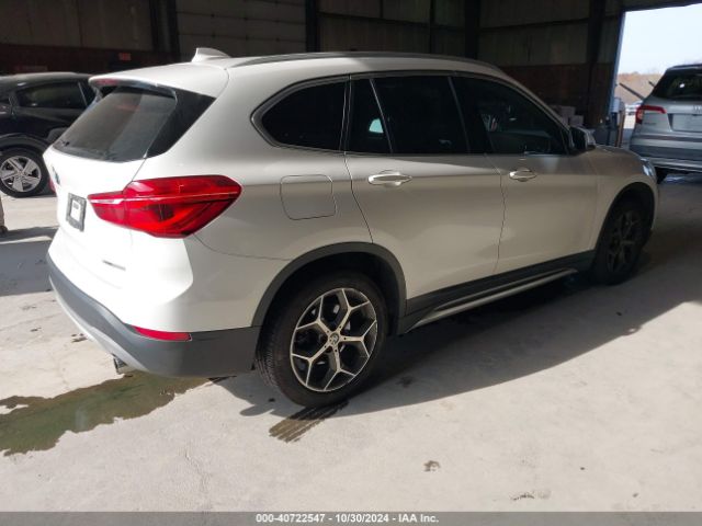 Photo 3 VIN: WBXHT3C37J5L33837 - BMW X1 