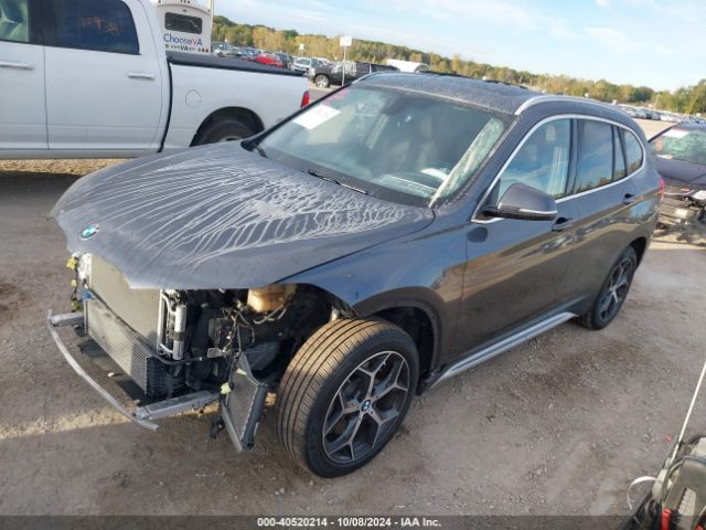 Photo 1 VIN: WBXHT3C37J5L34387 - BMW X1 