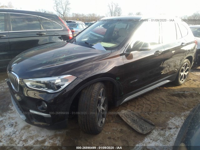 Photo 1 VIN: WBXHT3C38G5E47292 - BMW X1 