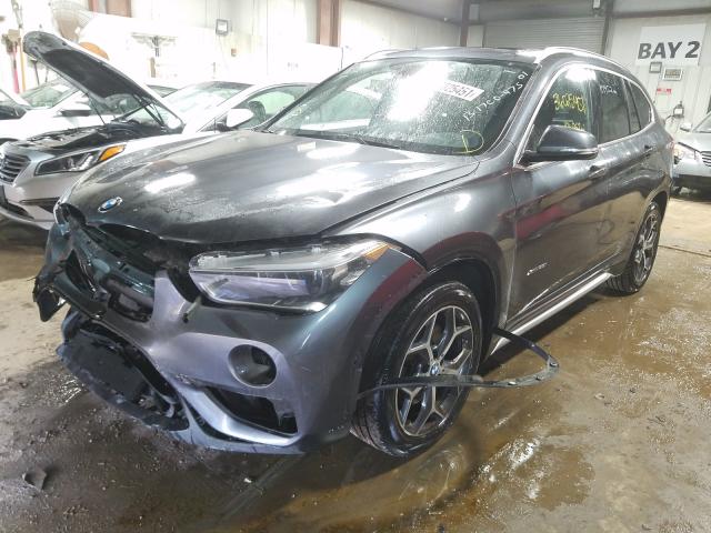 Photo 1 VIN: WBXHT3C38G5E48135 - BMW X1 