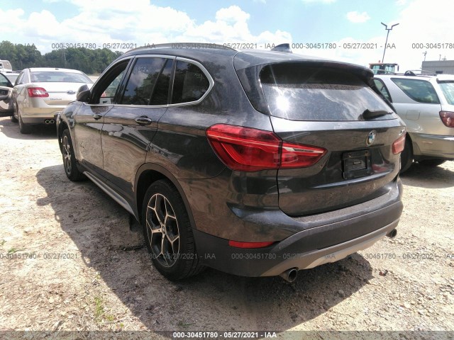 Photo 2 VIN: WBXHT3C38G5E48135 - BMW X1 