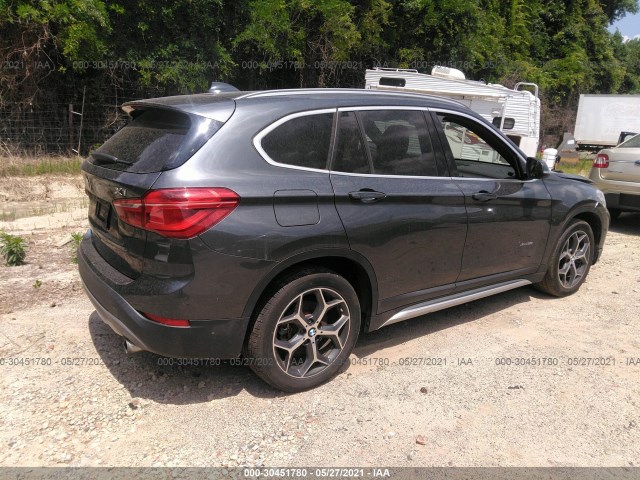 Photo 3 VIN: WBXHT3C38G5E48135 - BMW X1 