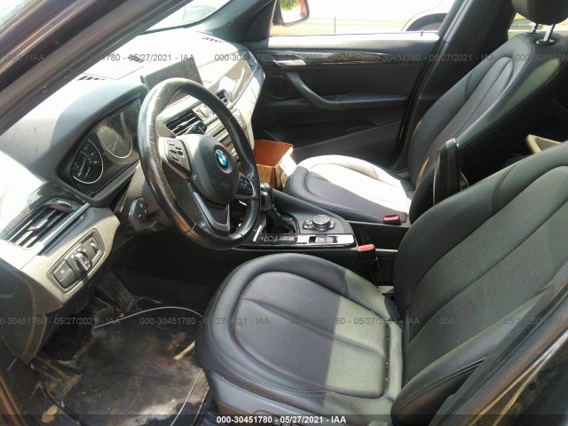 Photo 4 VIN: WBXHT3C38G5E48135 - BMW X1 