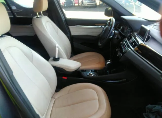 Photo 4 VIN: WBXHT3C38G5E50189 - BMW X1 