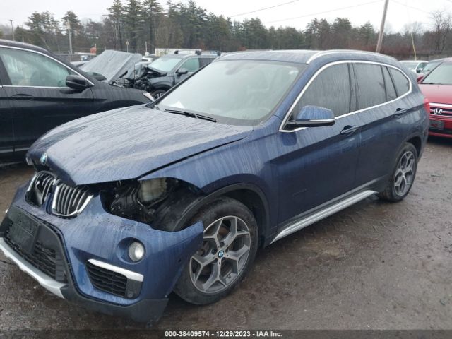 Photo 1 VIN: WBXHT3C38G5E51407 - BMW X1 