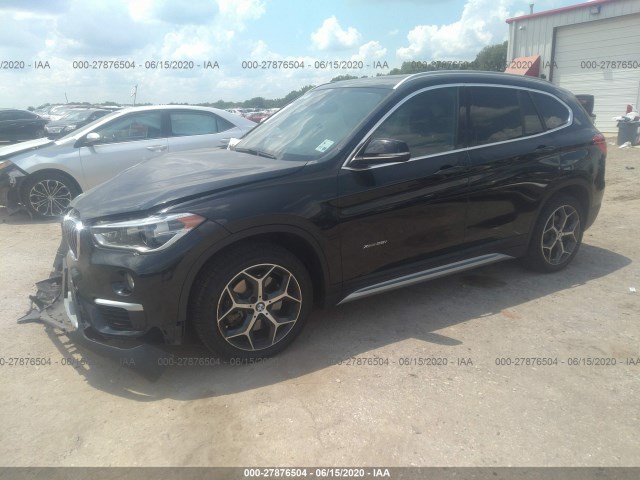 Photo 1 VIN: WBXHT3C38G5E52458 - BMW X1 