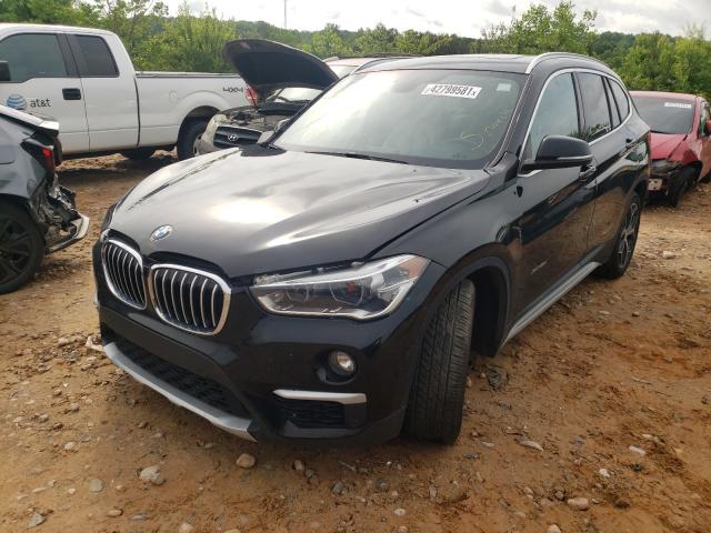 Photo 1 VIN: WBXHT3C38G5E55456 - BMW X1 