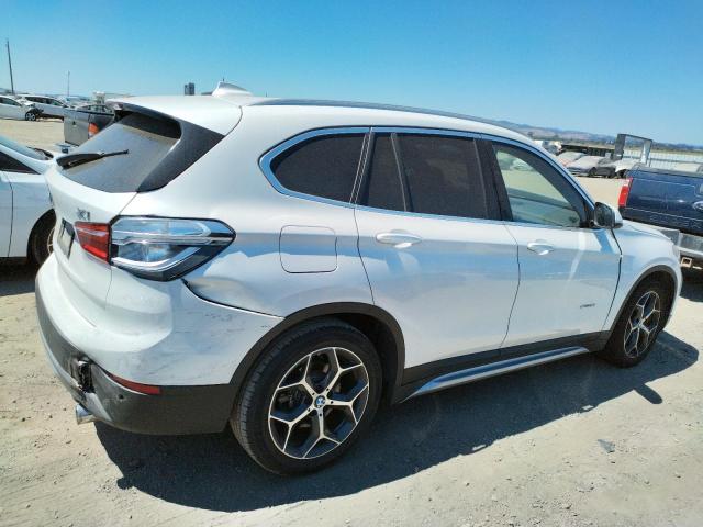 Photo 2 VIN: WBXHT3C38G5E55490 - BMW X1 XDRIVE2 