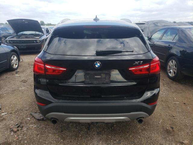 Photo 5 VIN: WBXHT3C38G5E55800 - BMW X1 