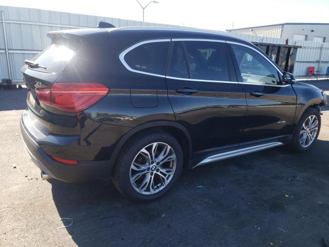 Photo 2 VIN: WBXHT3C38G5F67352 - BMW X1 