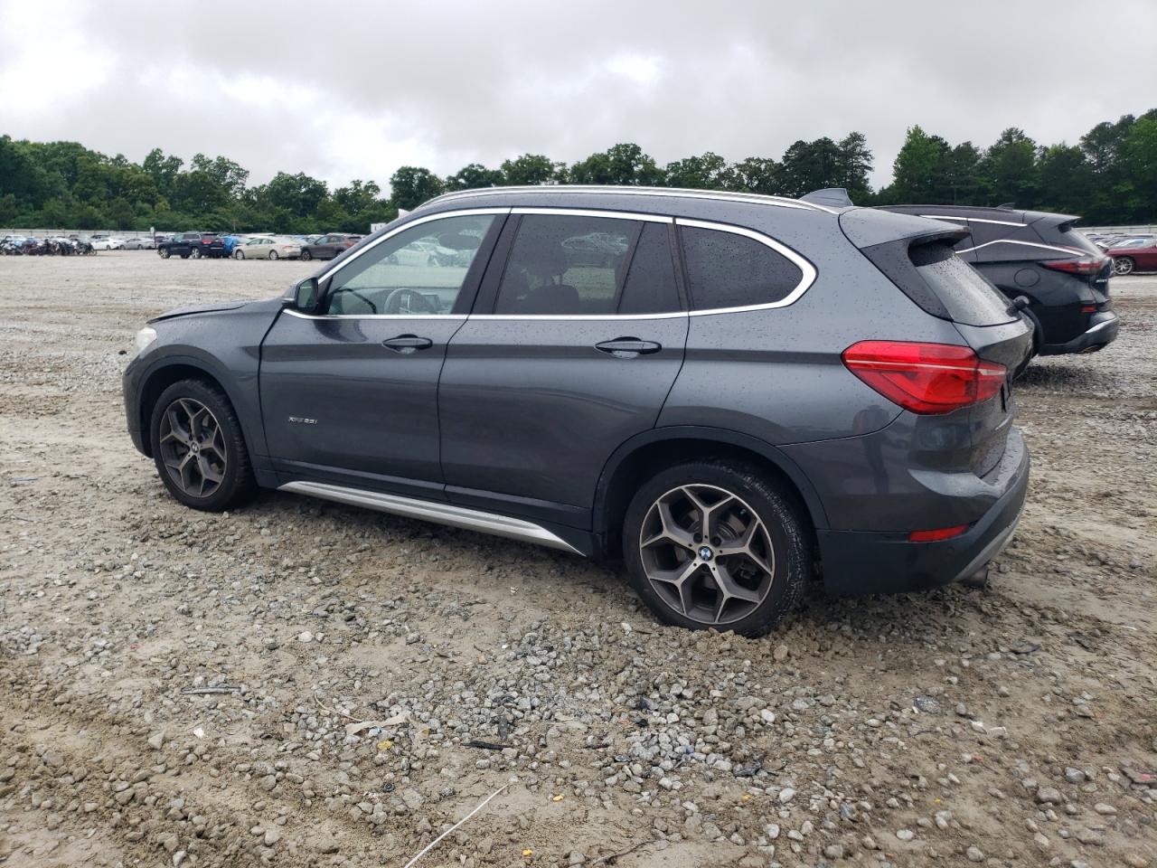 Photo 1 VIN: WBXHT3C38GP881553 - BMW X1 