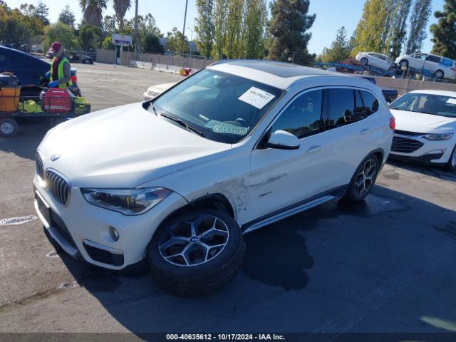 Photo 1 VIN: WBXHT3C38GP881911 - BMW X1 