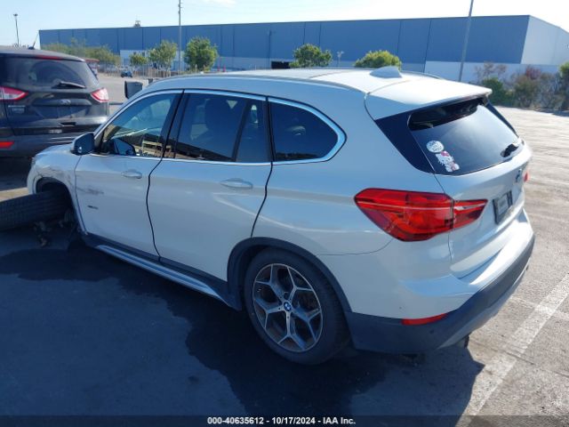 Photo 2 VIN: WBXHT3C38GP881911 - BMW X1 