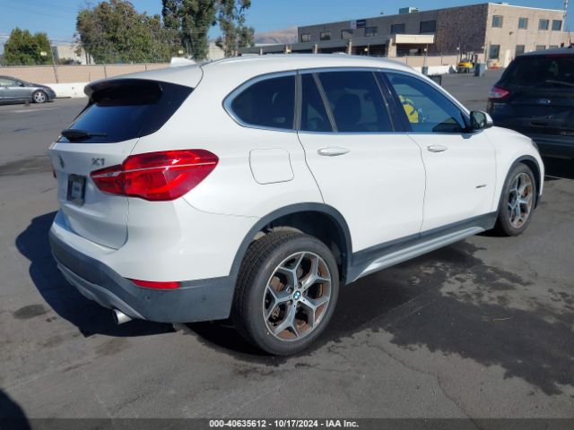 Photo 3 VIN: WBXHT3C38GP881911 - BMW X1 