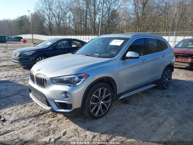 Photo 1 VIN: WBXHT3C38H5F69572 - BMW X1 