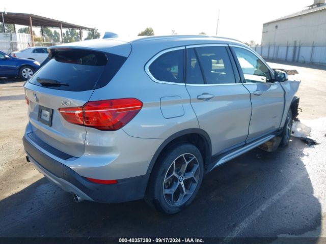 Photo 3 VIN: WBXHT3C38H5F72231 - BMW X1 