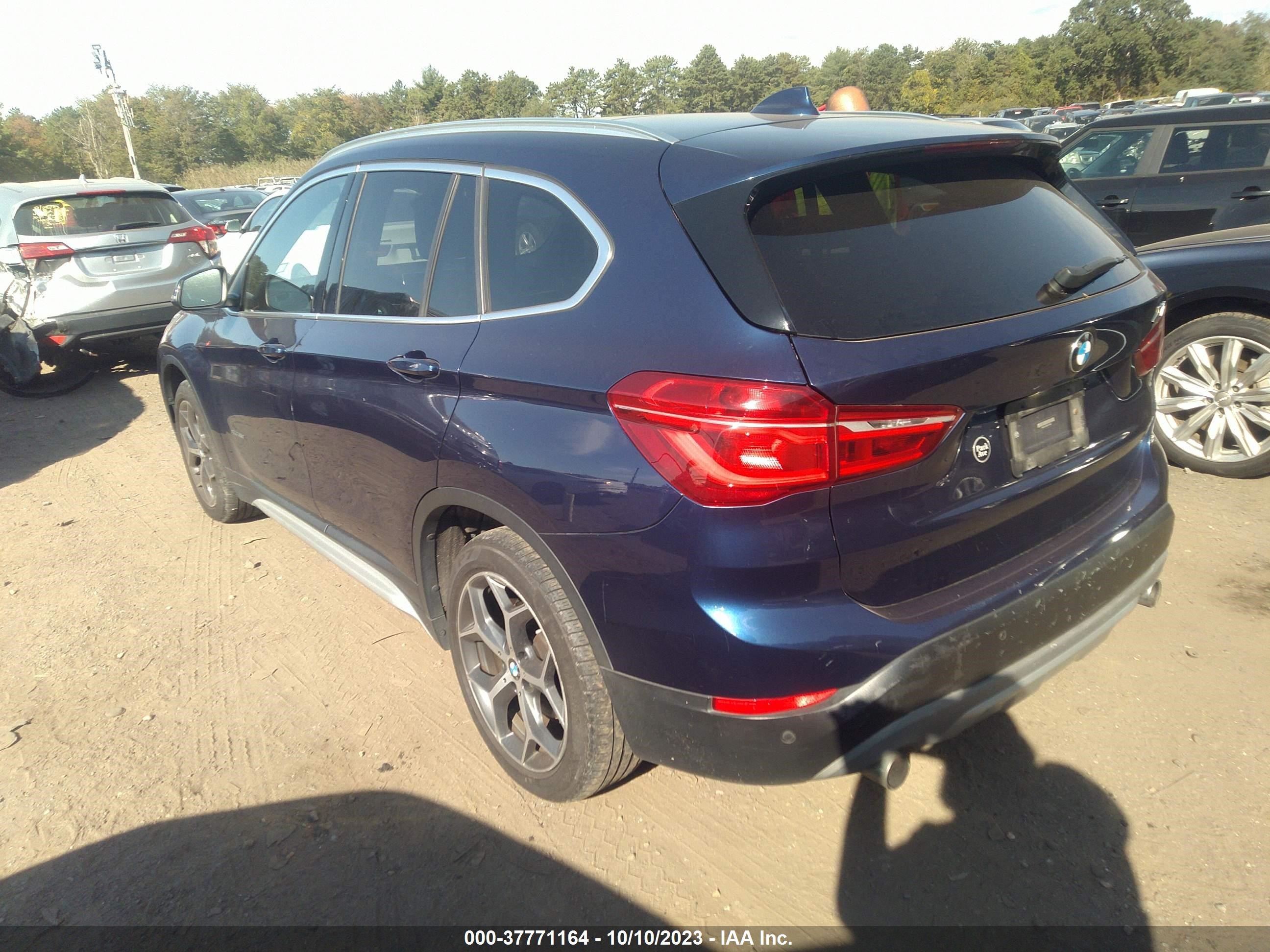 Photo 2 VIN: WBXHT3C38H5F75680 - BMW X1 