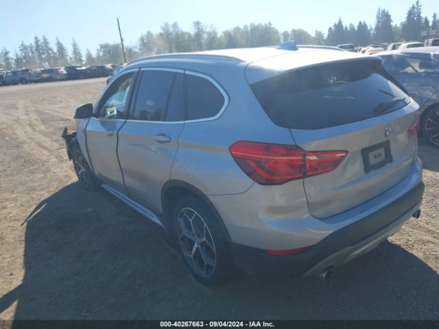 Photo 2 VIN: WBXHT3C38H5F77137 - BMW X1 