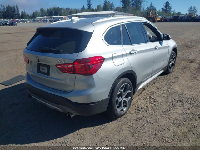 Photo 3 VIN: WBXHT3C38H5F77137 - BMW X1 