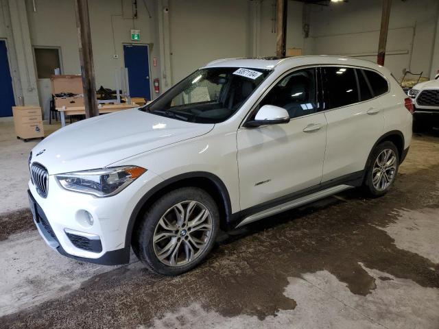 Photo 0 VIN: WBXHT3C38H5F84590 - BMW X1 