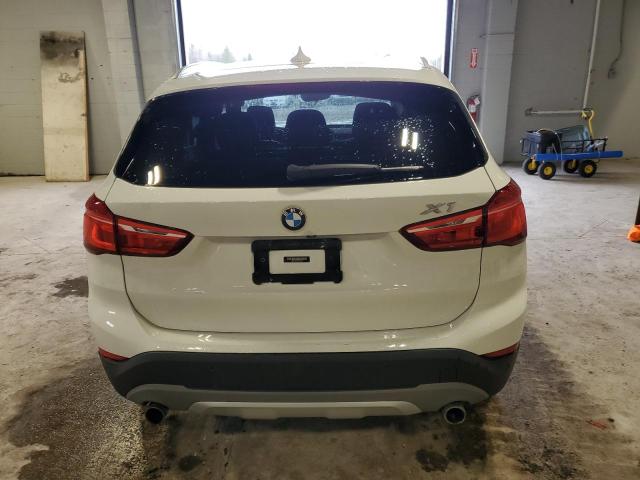 Photo 5 VIN: WBXHT3C38H5F84590 - BMW X1 