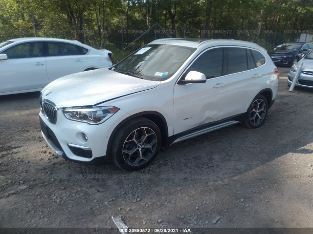 Photo 1 VIN: WBXHT3C38H5F84945 - BMW X1 