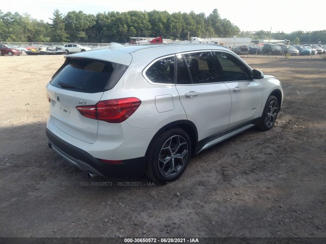 Photo 3 VIN: WBXHT3C38H5F84945 - BMW X1 