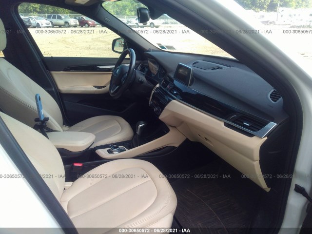 Photo 4 VIN: WBXHT3C38H5F84945 - BMW X1 