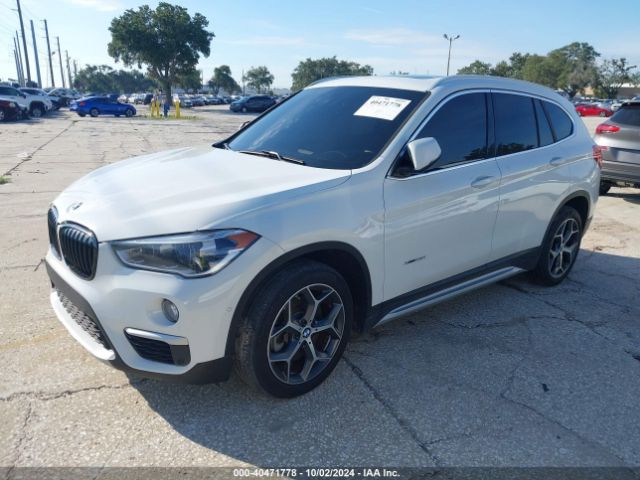 Photo 1 VIN: WBXHT3C38H5F86095 - BMW X1 