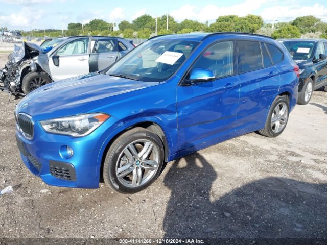 Photo 1 VIN: WBXHT3C38J3H32366 - BMW X1 