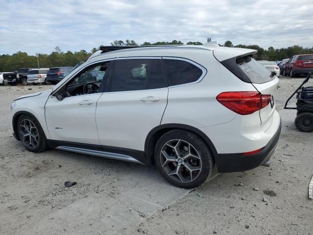 Photo 1 VIN: WBXHT3C38J5F88872 - BMW X1 