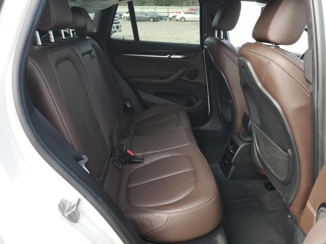 Photo 10 VIN: WBXHT3C38J5F88872 - BMW X1 