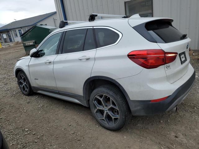 Photo 1 VIN: WBXHT3C38J5F89617 - BMW X1 