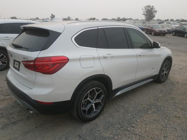 Photo 3 VIN: WBXHT3C38J5F93439 - BMW X1 XDRIVE2 