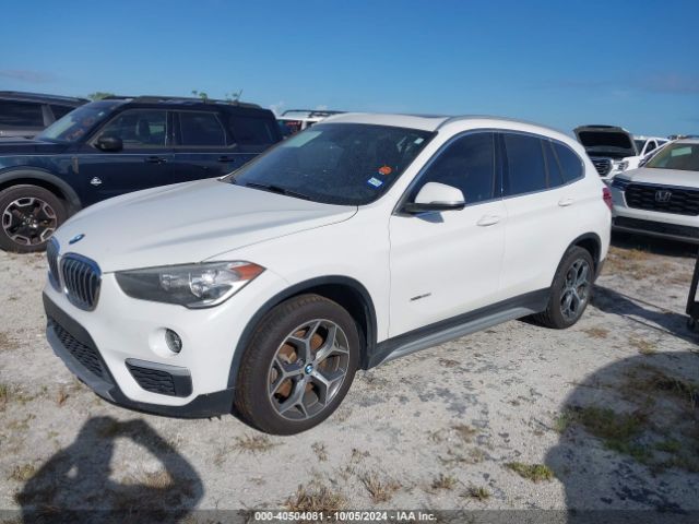 Photo 1 VIN: WBXHT3C38J5K22276 - BMW X1 